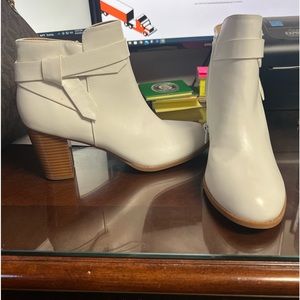 Boots with heels never worn! They were too big for my feet.